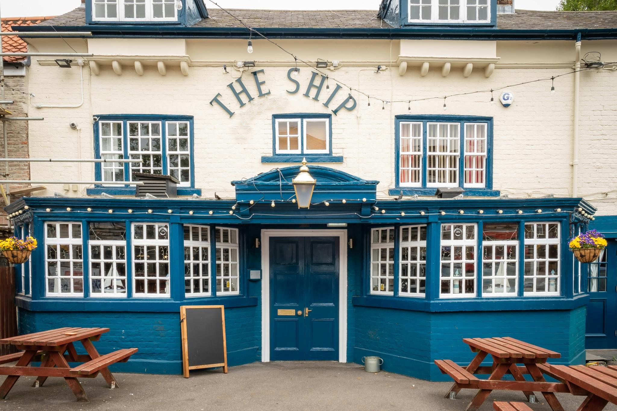 Decorative header image of a pub